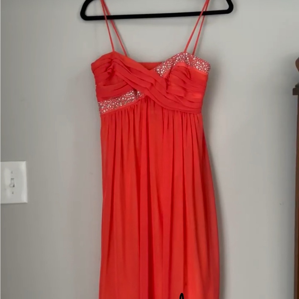 Tangerine orange mini dress by Intrigue. Made in the USA. 100% Polyester.